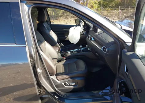 2021 Mazda Cx-5 Signature z USA, uszkodzony, nr VIN JM3KFBEY6M0449522